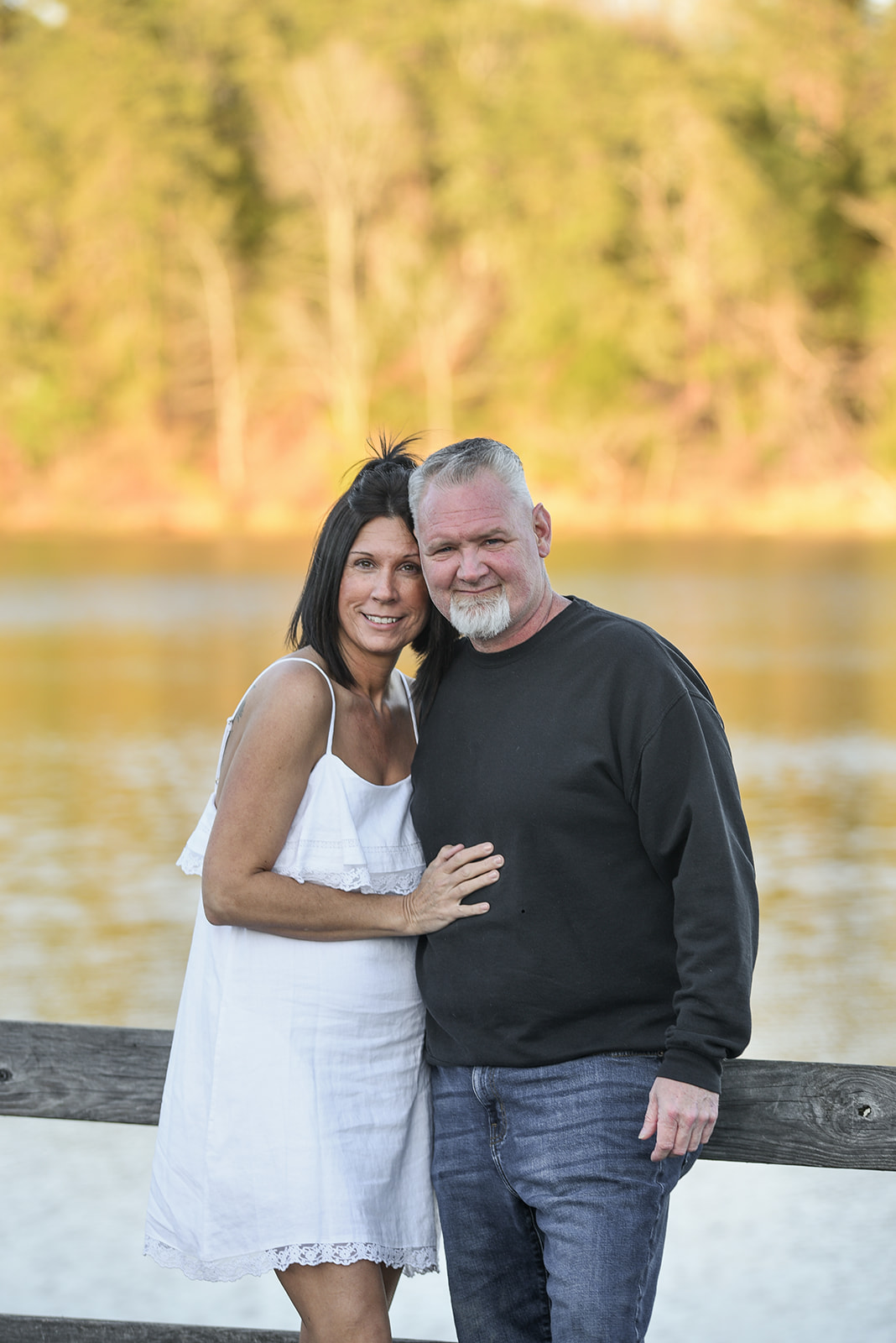 Couple walking on Kennesaw Mountain trail during engagement session in Georgia