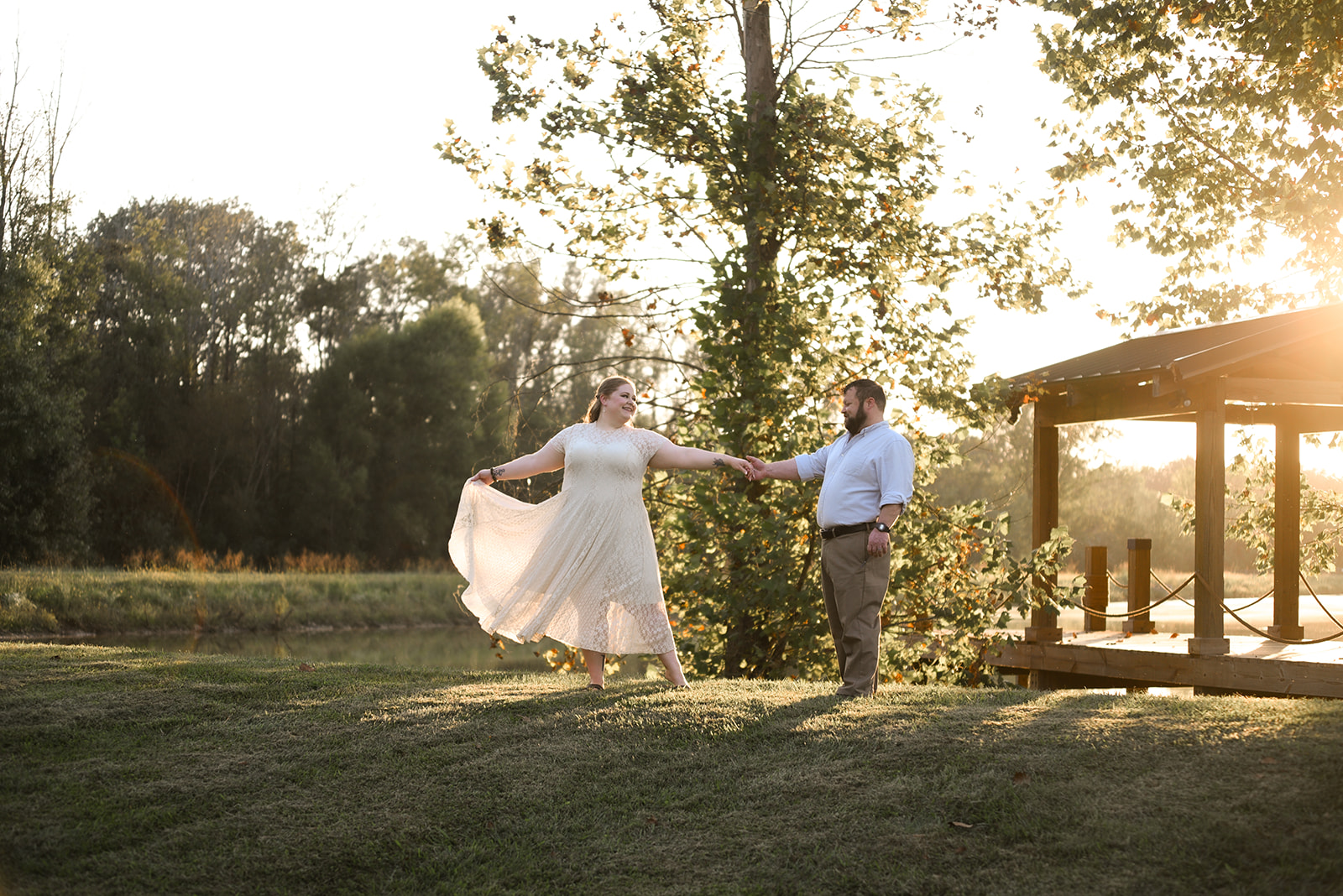 Couple walking on river path in Sandy Springs GA engagement session