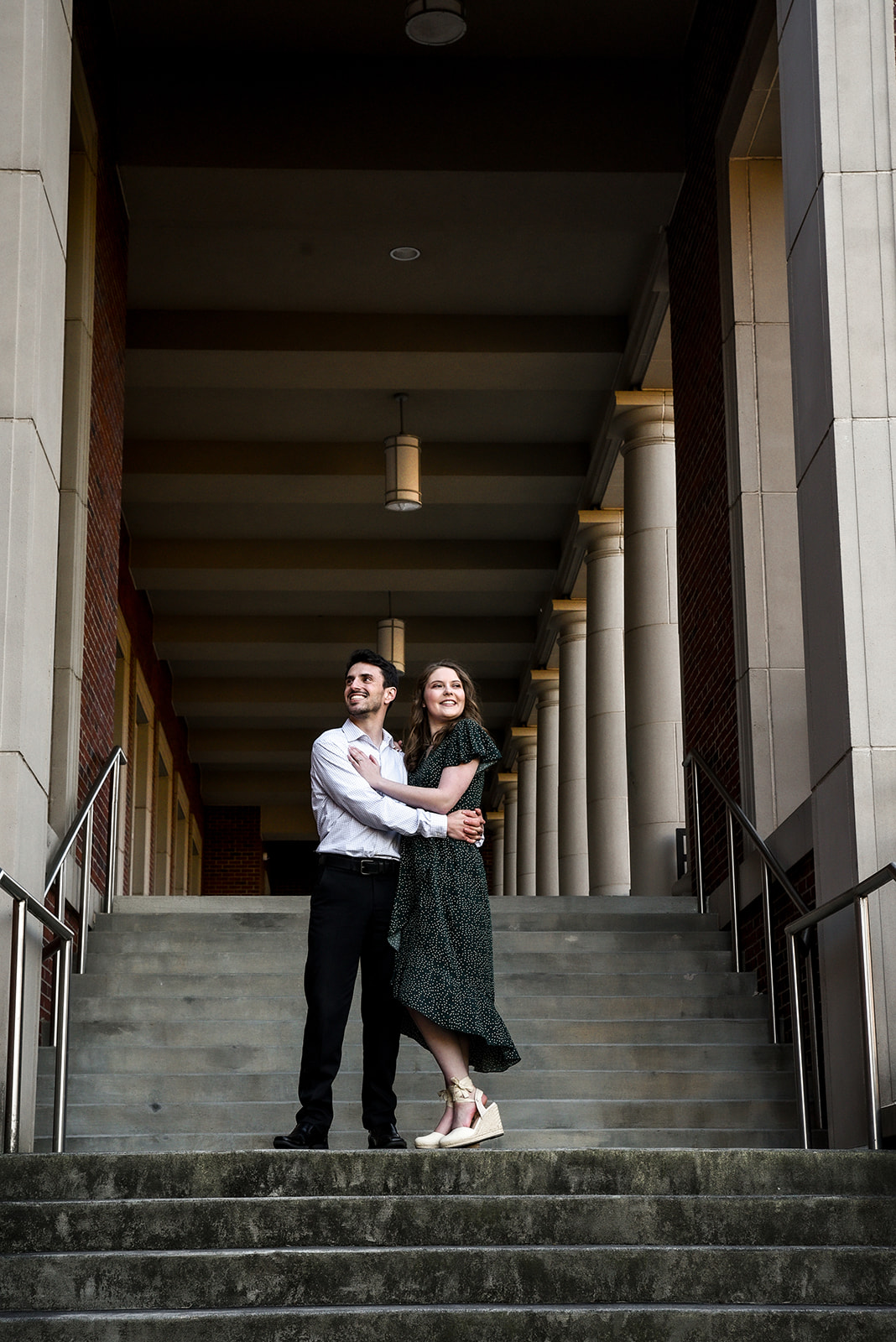 Couple walking in downtown Decatur Georgia engagement session