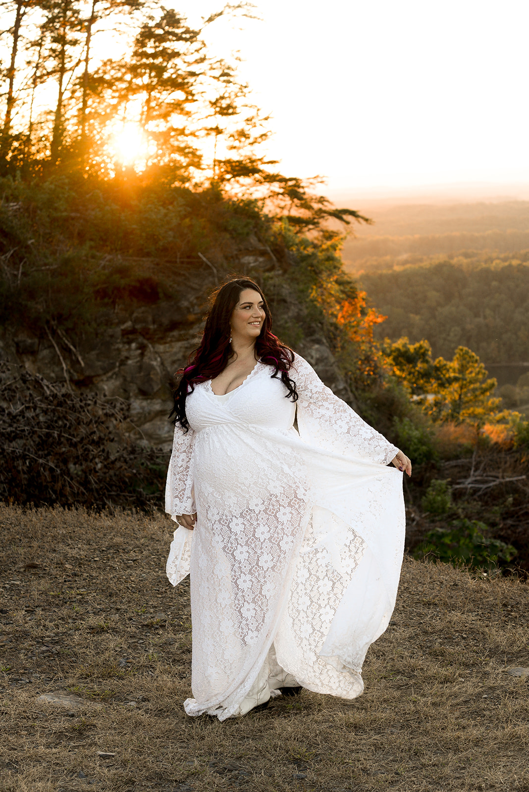 Maternity portrait in mountain foothills near Jasper GA, soft afternoon light over ridgeline