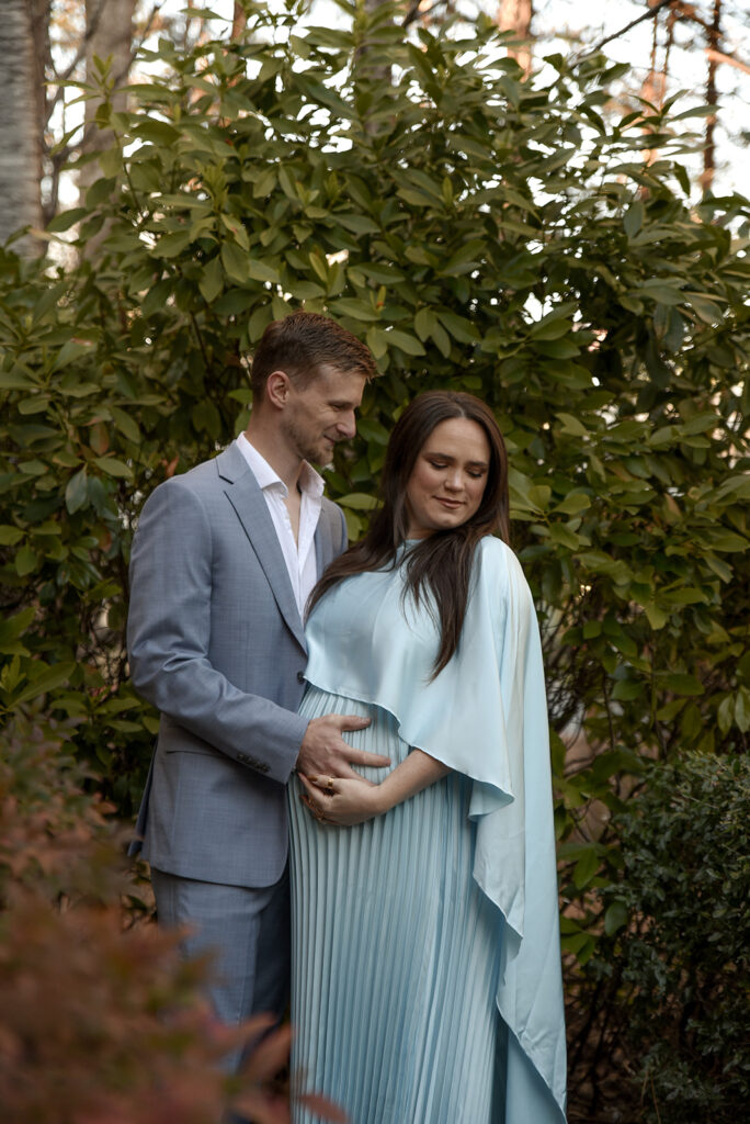 Expecting mother during outdoor maternity photography session in Georgia