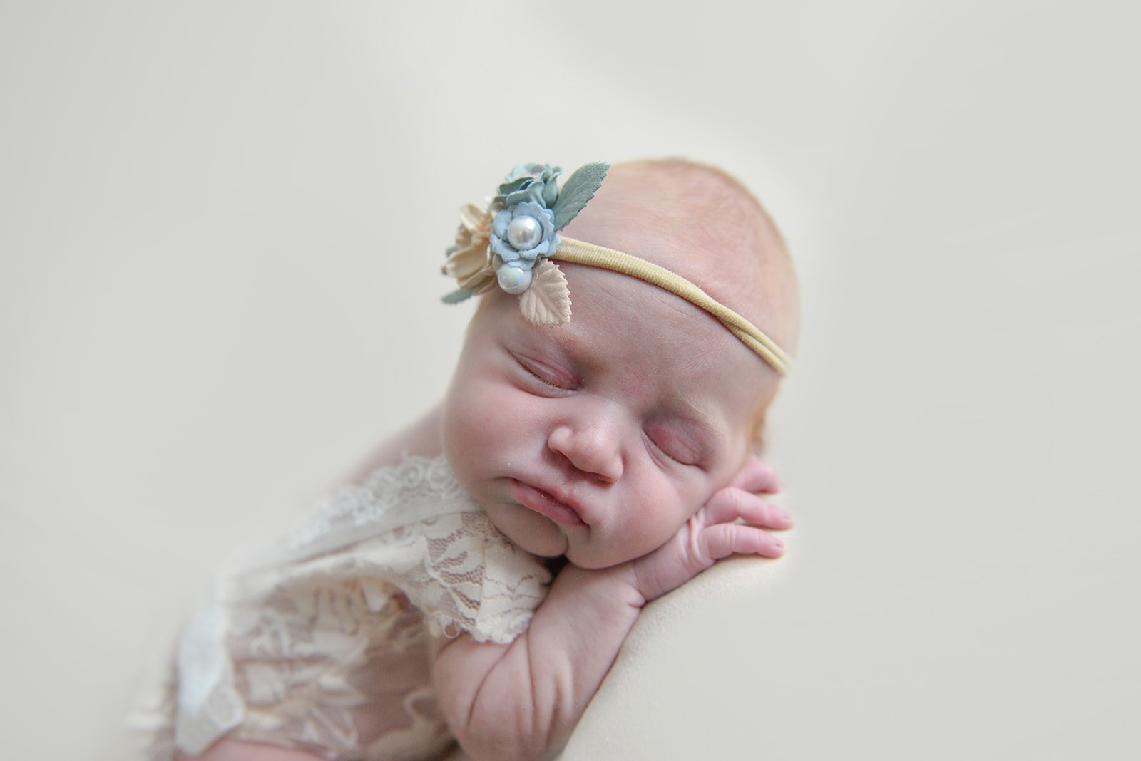 Newborn with headband